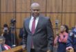 General Shadrack Sibiya walks through the Randburg Magistrate's Court on September 29, 2026, with media and police officers in the background. Photo: Nkazimulo Ncube