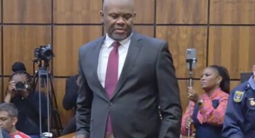 General Shadrack Sibiya walks through the Randburg Magistrate's Court on September 29, 2026, with media and police officers in the background. Photo: Nkazimulo Ncube