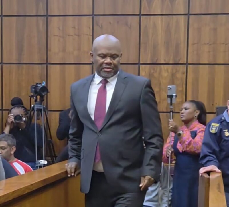 General Shadrack Sibiya walks through the Randburg Magistrate's Court on September 29, 2026, with media and police officers in the background. Photo: Nkazimulo Ncube