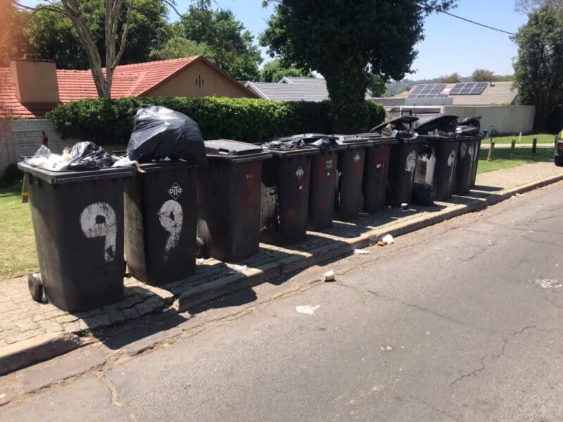 Overflowing bins and severe pest concerns mount across Ferndale Ridge, Blairgowrie, and Ward 102 as Pikitup works to clear a backlog in household refuse collection.