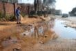 Ward 102 councillor Bea Campbell-Cloete at the troubling leak on Pretoria Road in Ferndale. Photo: Mthulisi Lwazi Khubon