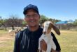 Molefe Mosenogi from Randburg SPCA and one of their adorable kid goats encourages you to choose Randburg SPCA and stand a stand to win R50 000. Photo: Supplied