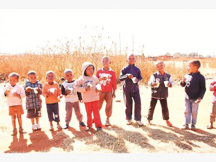 A few of the children who received soup and bread from Feed A Child.
