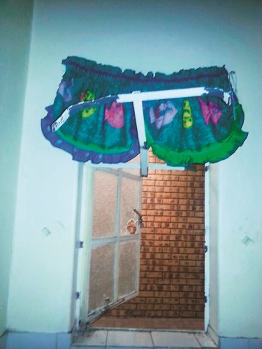 Bathroom window where robbers gained access.