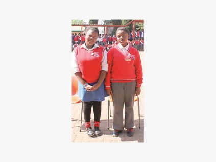 Left: Grade 8 top achievers: Vumezinhle Simelane and Dorcas Makhabela.