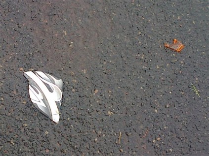 On Saturday, pieces of Mr Msimango's helmet, which splintered in the assault, were picked up in Helen Joseph Street, where the incident took place.