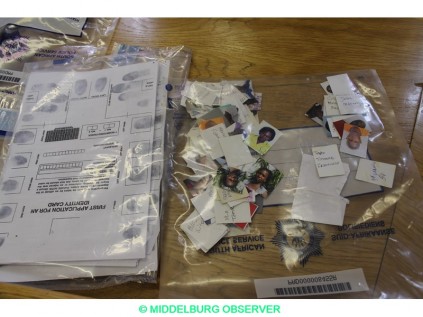 Evidence of many more people who were in the process of obtaining false documents from the suspects.