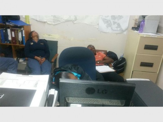The photo of on duty police officers sleeping, and leaving the charge offices unmanned.