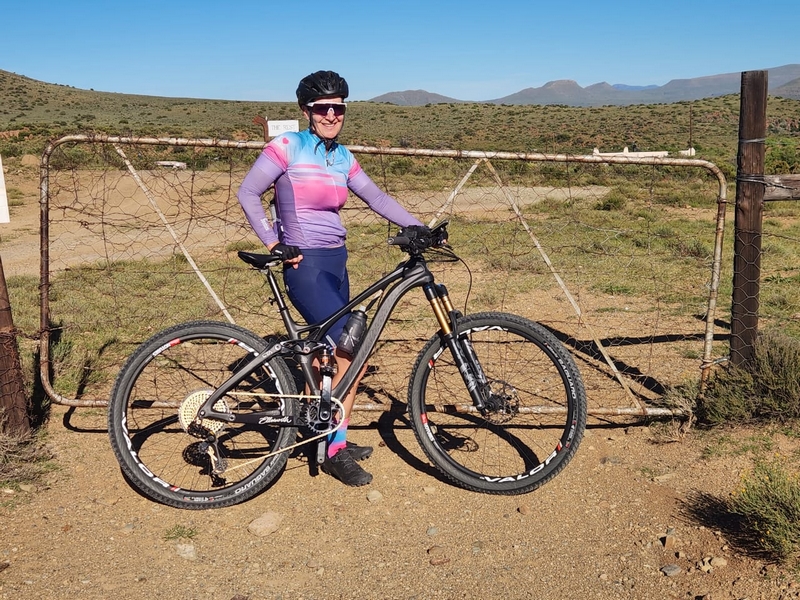Woman with bicycle.