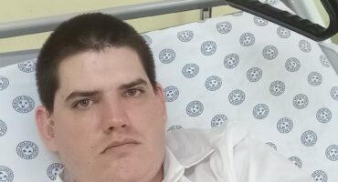 Boy in hospital bed