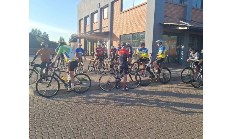 Cyclists on their bikes ahead of race.