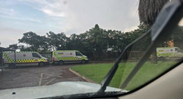 EMS says no ambulances available despite three parked unused outside hospital.