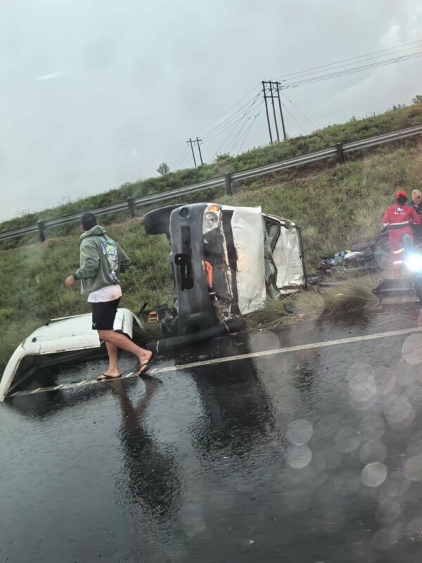A white bakkie damaged during a crash.