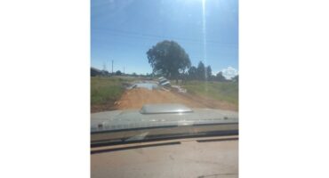 A police vehicle had to be towed from a Belfast pothole.