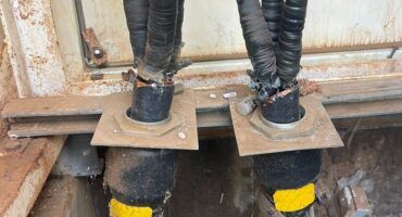 Cables sawed through.