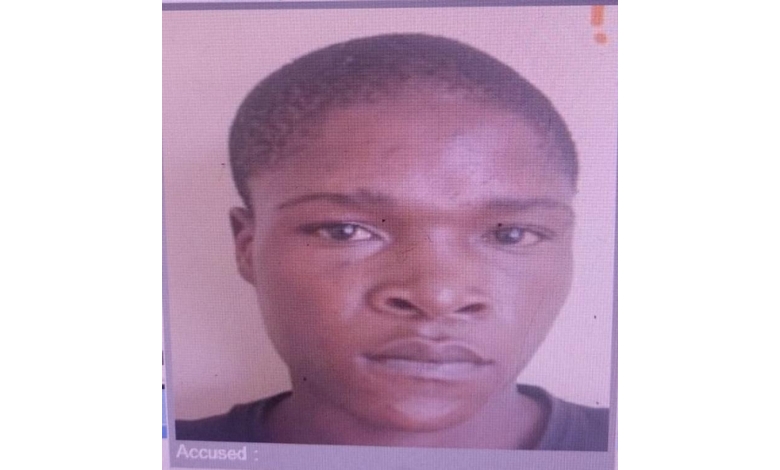 A young man with short hair is depicted in a headshot-type photo with the words “Accused” written underneath the photo.