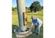 Councillor Elsie Vermooten looking at the damage caused to a high mast light pole.