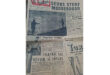 Alt text: A vintage newspaper page featuring a large headline in Afrikaans. The black-and-white image shows two people fishing on a rocky shoreline. Various articles and an advertisement are visible, adding a historical and nostalgic tone to the scene.