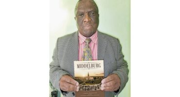 Former mayor Ben Mokoena with his book. PHOTO: Ben Mokoena