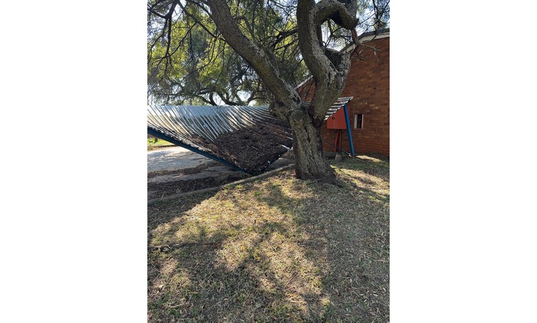 A collapsed carport.