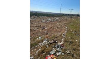 Tons of trash illegally dumped.
