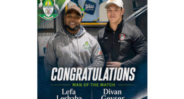 Two men stand side by side, smiling, with the word "Congratulations" displayed above them.
