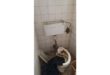 A broken toilet.