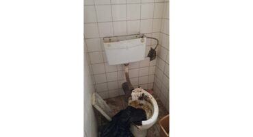 A broken toilet.