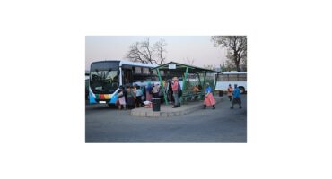 Bus commuters at the pickup point.