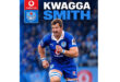 A rugby player sprinting forward while holding the ball, showcasing athleticism and determination on the field.