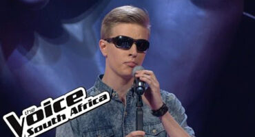Vernon perform during the blind auditions of "The Voice of South Africa," showcasing his vocal talents.