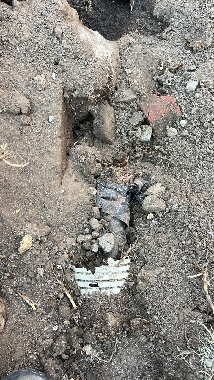 Section of ground in Wesselton where suspects allegedly dug up medium-voltage cable during theft attempt.