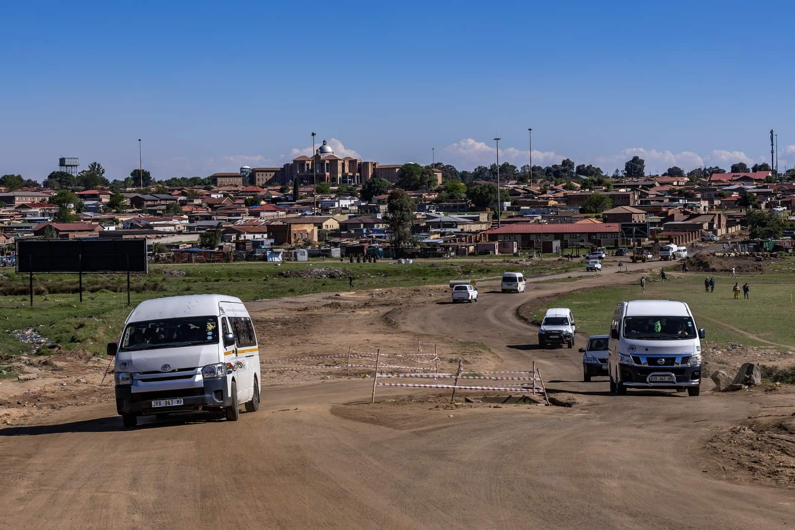 Vehicles driving on a section of Magwaza Street in Wesselton, which is still under construction.