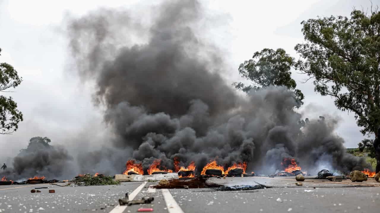 Tyres and rocks placed on the N17 near Ermelo by protesters to block traffic during a service delivery protest.