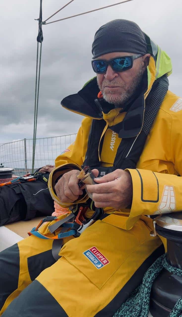 Bobby Van Strijp’s father enjoying biltong from a local Ermelo Butchery onboard the yacht, part of his weekly “Bier om Vier” tradition.