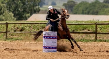 Rider competing in a barrel racing run during a previous year’s BRSA event.