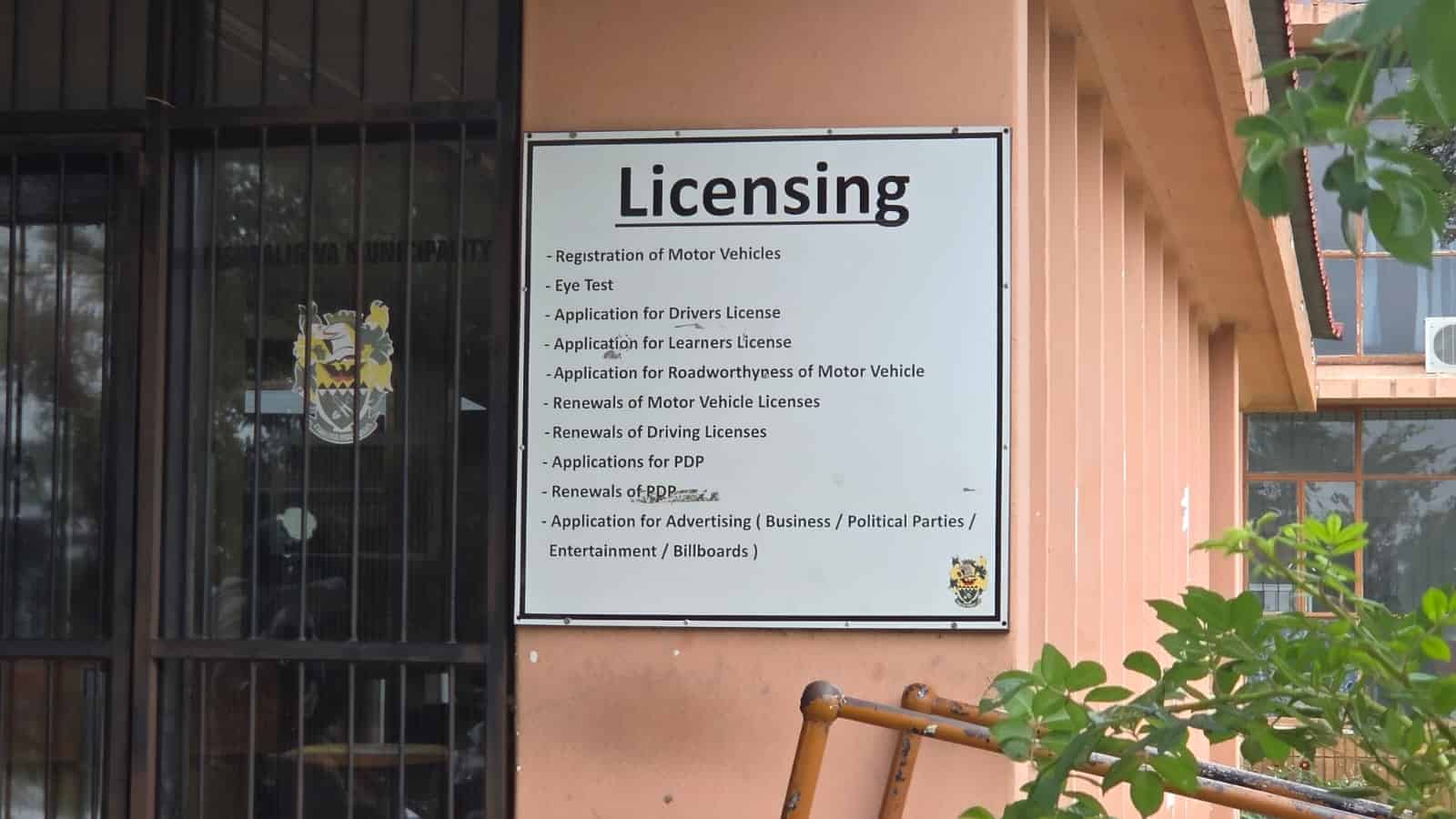 Information board at the Ermelo licensing offices showing available services as the public waits for reopening details.