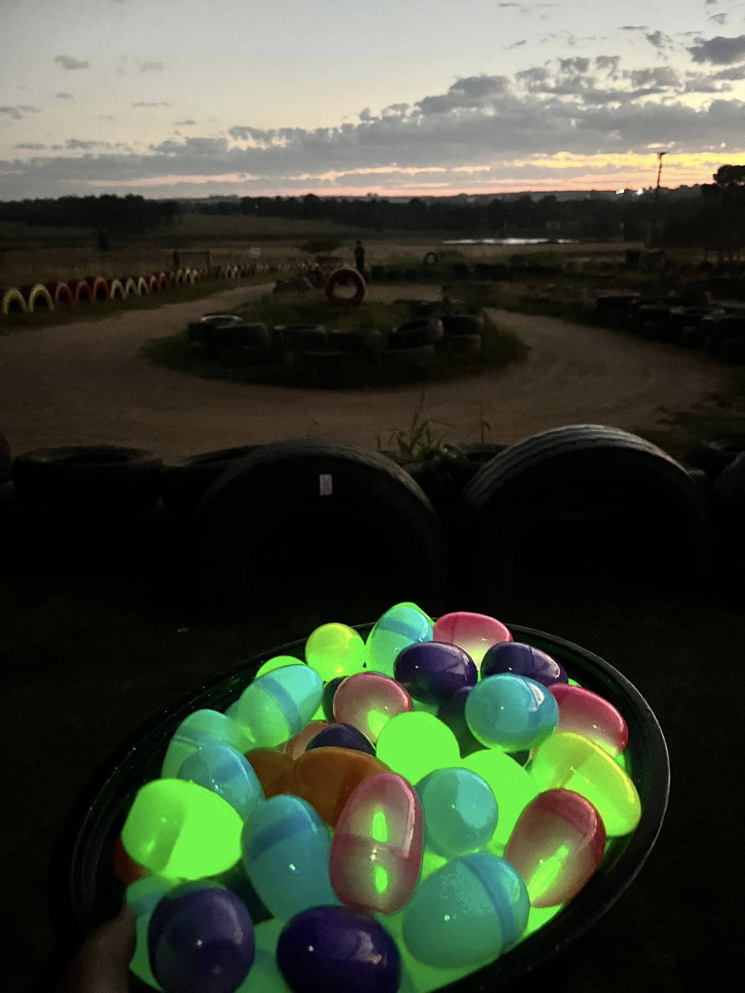 Families attending a glow-in-the-dark Easter egg hunt fundraiser in Ermelo