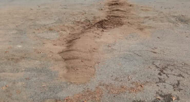 Slaggate in Camdenlaan Ermelo opgevul met sand en bourommel