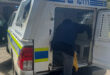 A woman suspected of a crime entering a SAPS police van after an arrest in Jansen Street.