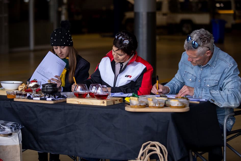 Judges evaluating potjiekos dishes at Ermelo Toyota Legend Fest