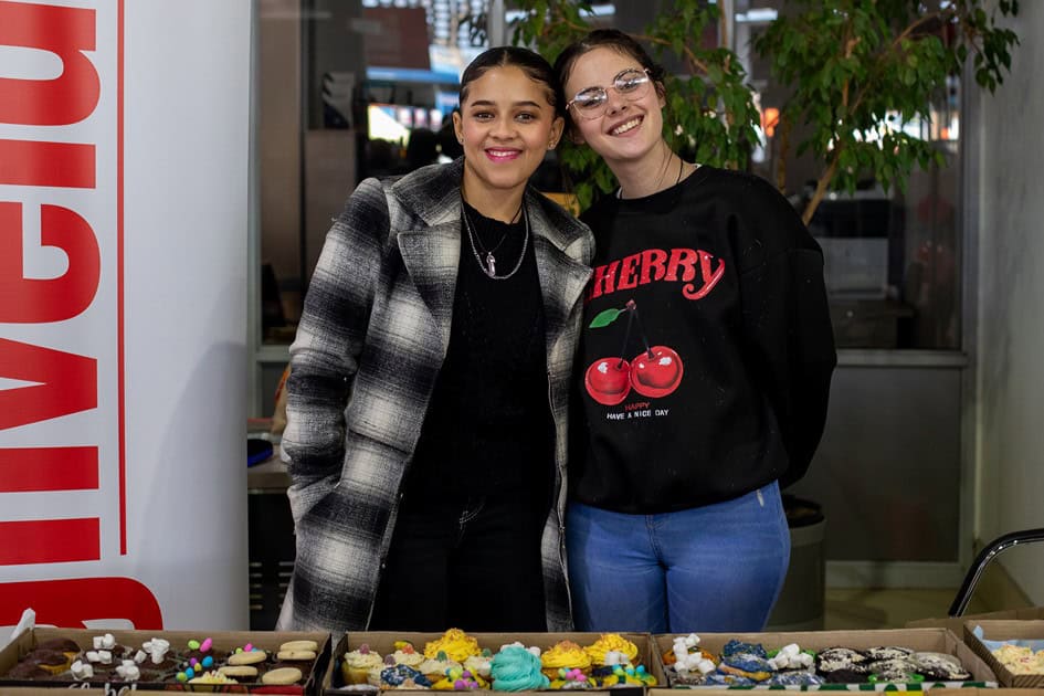 Lavey Sim and Abigail Els assisting at Highvelder cupcake stall during Ermelo Toyota Legend Fest