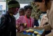 René Joubert handing out cupcakes to children at Ermelo Toyota Legend Fest