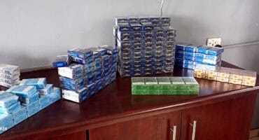 Confiscated cigarettes displayed during Operation Shanela II in Mpumalanga.