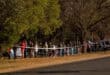 Voters queue outside the Ermelo Sport Inn during the 2024 elections.