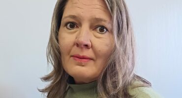 Portrait of Sanet McFadden, Ridge Times receptionist