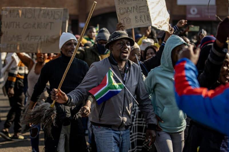 Protesters gathered at the De Jager and Naudé Street intersection in Ermelo during a march.