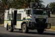 Armoured police vehicle moving through Ermelo CBD toward Msukaligwa Municipality