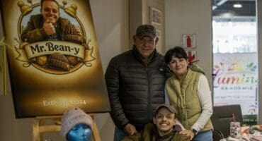 JJ Botha poses with his parents at his Mr. Bean-y stall during the Ermelo Toyota Legend Fest.