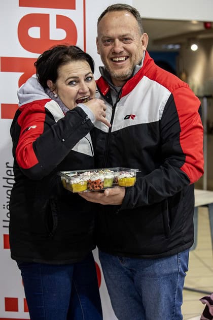 Elize Anderson and Jaco Botha enjoy cupcakes baked and donated by community members during the Ermelo Toyota Legend Fest.